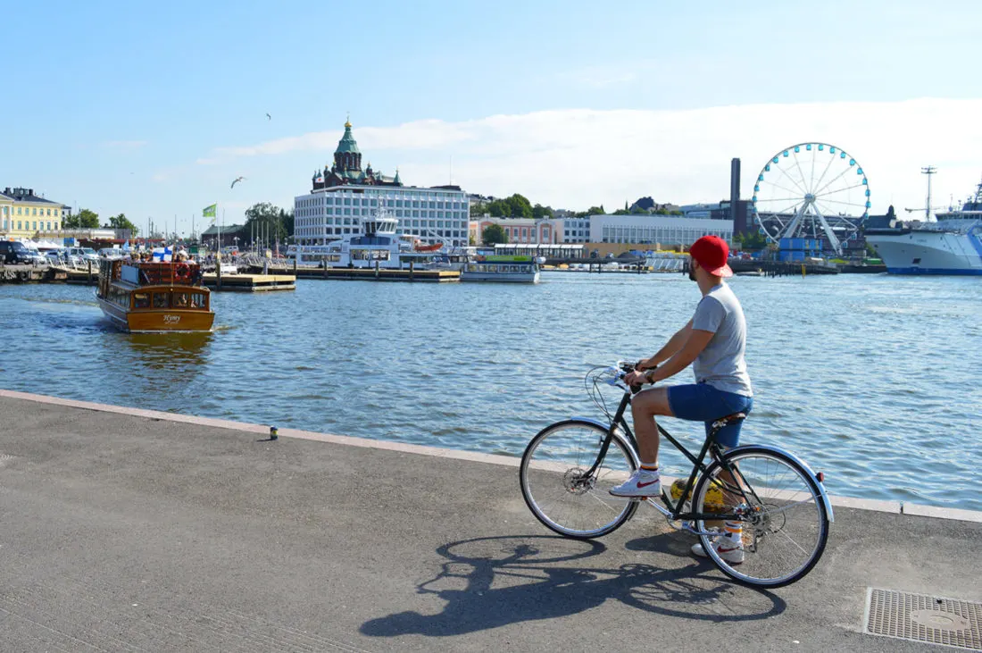 Karl is biking the Finnish capital Helsinki | Gay Couple City Weekend Helsinki Finland © Coupleofmen.com
