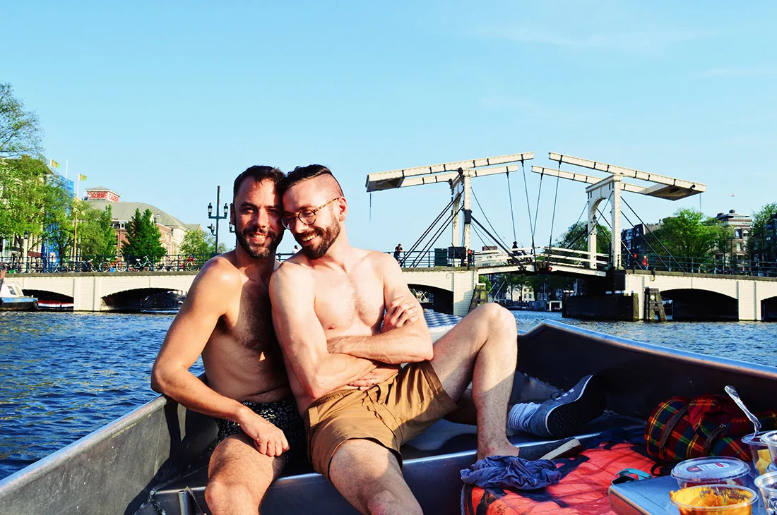 Karl and Daan on a boat trip together with Kit Williamson and John Halbach | Rent Canal Boat Amsterdam Boats4rent © CoupleofMen.com