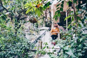 Art Boutique Hotel WindsoR Nice France gay-friendly two guys kissing in a green garden