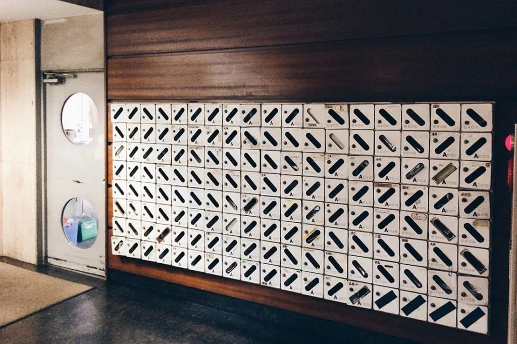 Postboxes in the Lobby of the Nakagin Capsule Tower in Tokyo © CoupleofMen.com