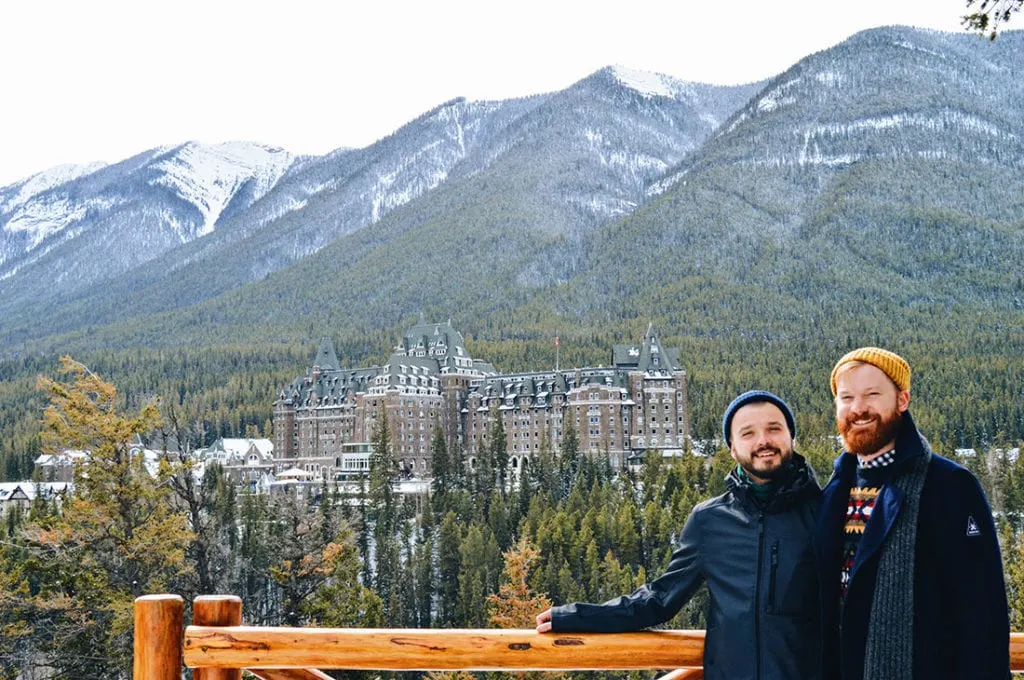 Gay Travel Blogger Couple of Men in front the Fairmont Banff Springs Castle Hotel Gay-Friendly © CoupleofMen.com
