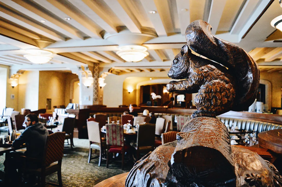Wooden Figures at the dining room for breakfast | Fairmont Banff Springs Castle Hotel Gay-Friendly © CoupleofMen.com