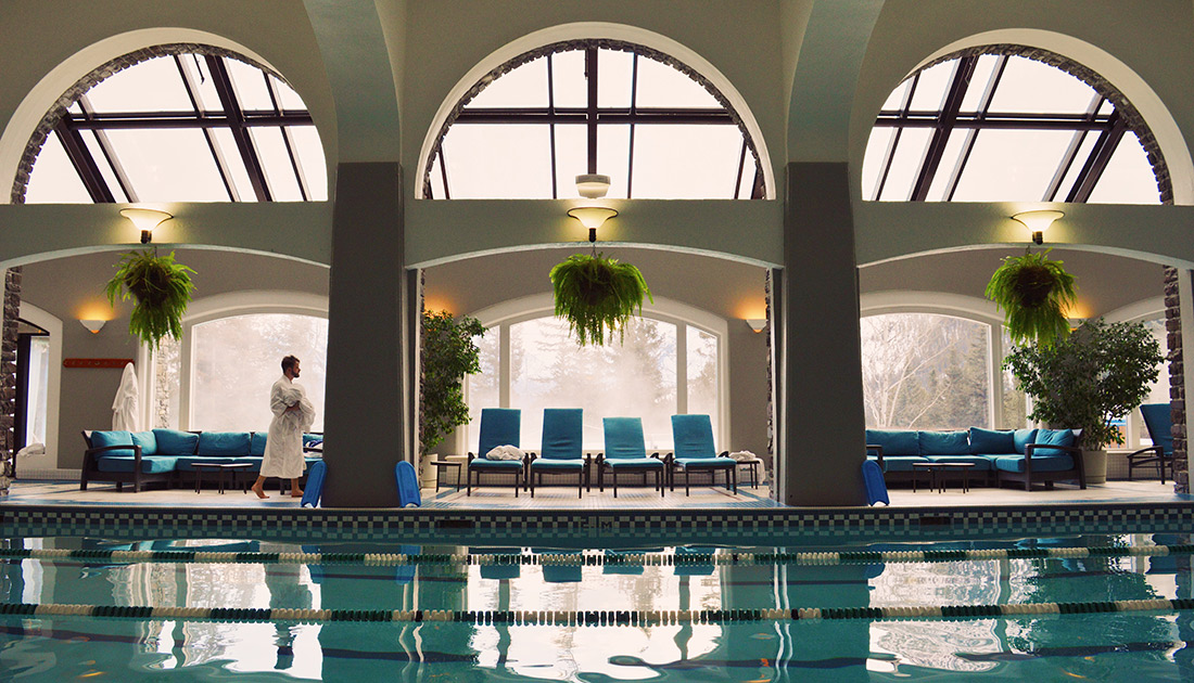 Indoor Pool with Mountain View | Fairmont Banff Springs Castle Hotel Gay-Friendly © CoupleofMen.com