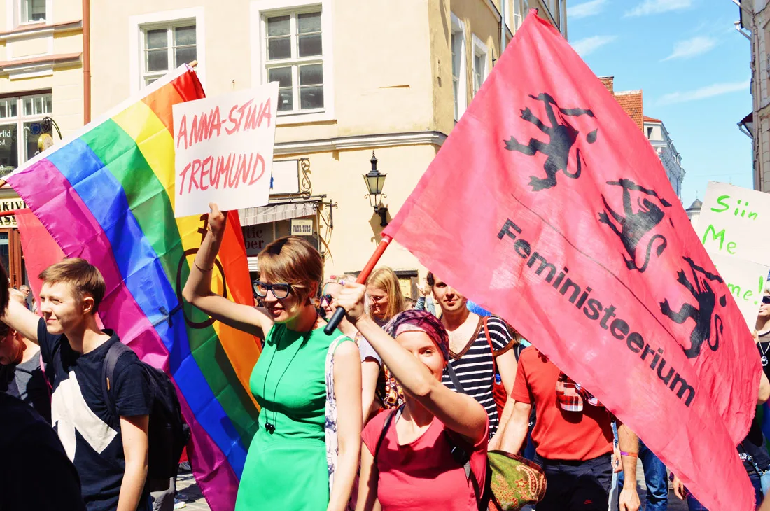 Female participants with rainbow flags attending Baltic Pride 2017 Tallinn Best Powerful LGBTQ Photos © CoupleofMen.com