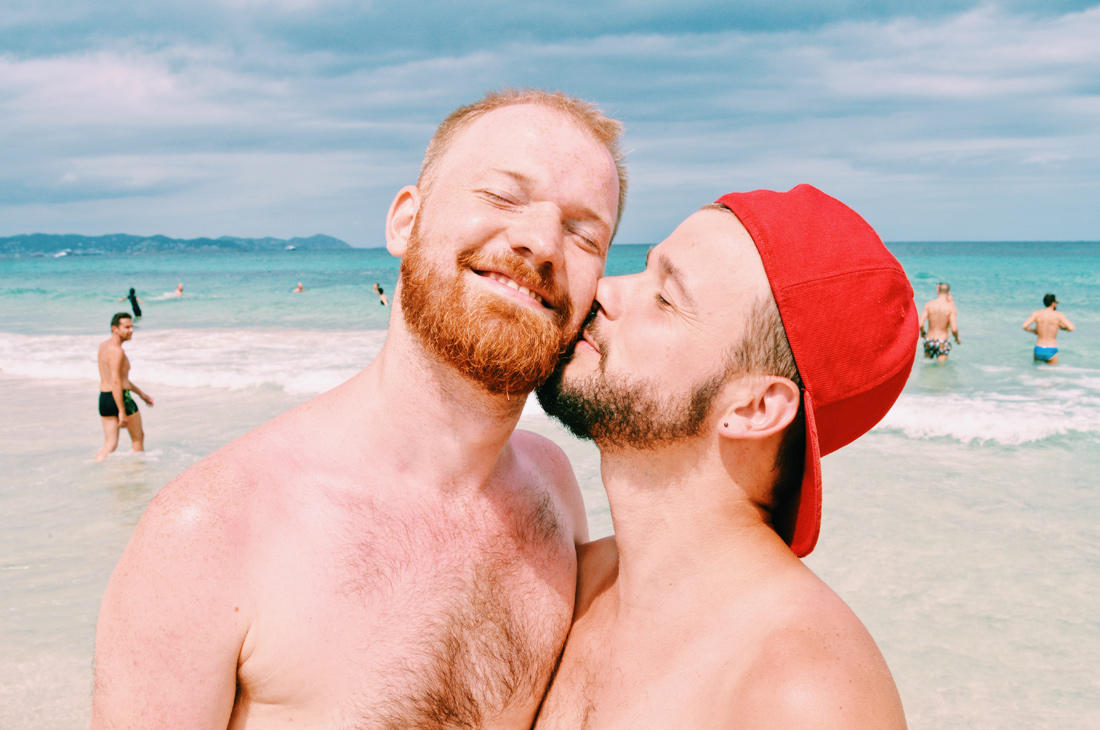 Ibiza Gay Travel Tips Gay Travel Ibiza Spartacus Gay Travel Index 2018 Karl & Daan kissing at the Beach | Gay Couple Travel Ibiza Gay Beach The Cruise Spain © CoupleofMen.com