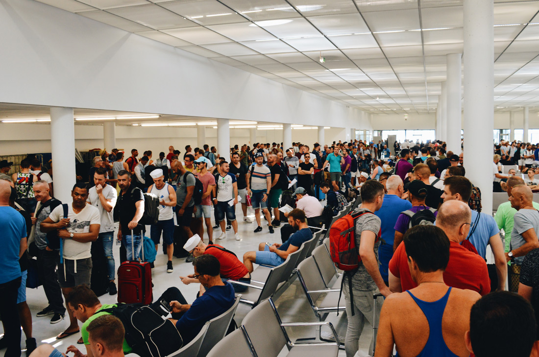 What a queue due to system failure at the terminal © CoupleofMen.com