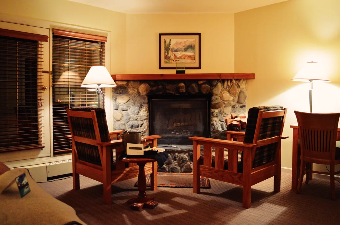 Sitting area in front of our open fire place | Emerald Lake Lodge gay-friendly © Coupleofmen.com