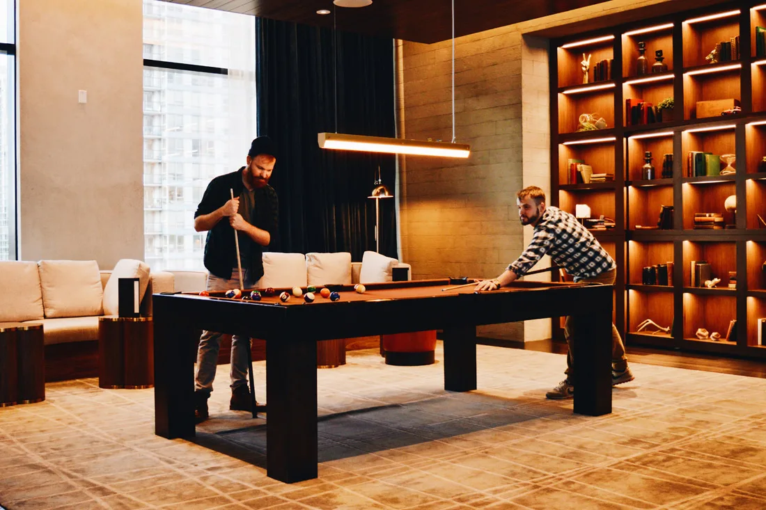 Playing Pool in the Lounge © CoupleofMen.com