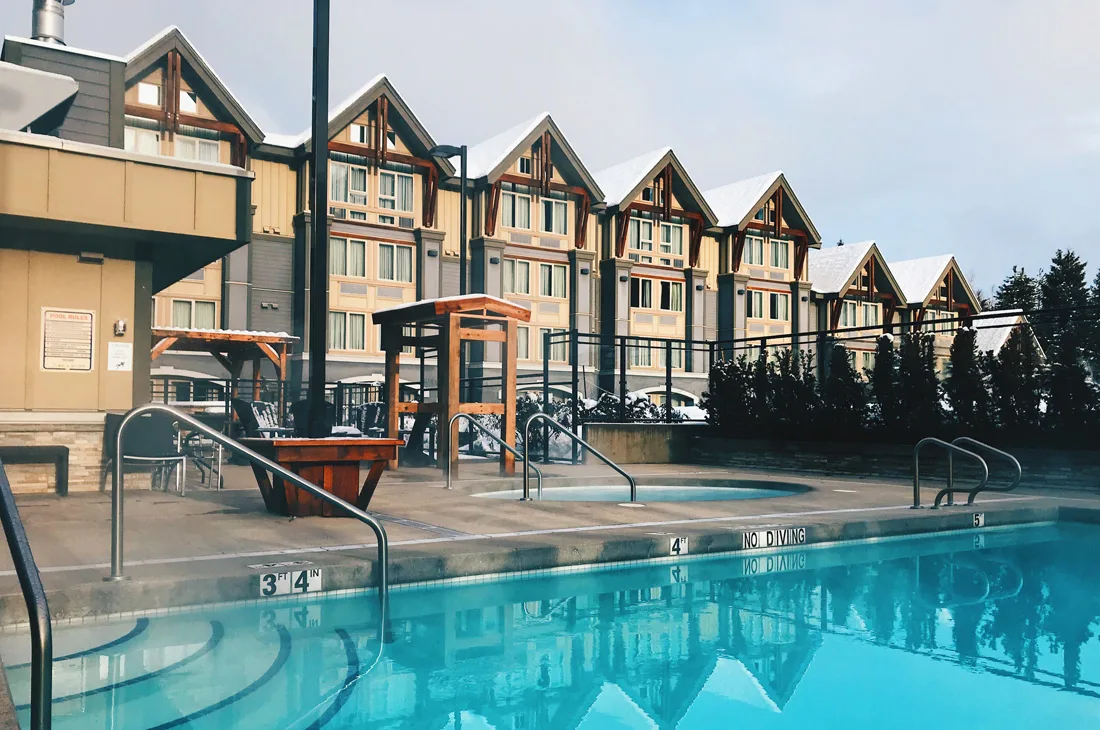 Outdoor pool & hot tub for after skiing relaxation | Whistler Pride 2018 Gay Ski Week © Coupleofmen.com