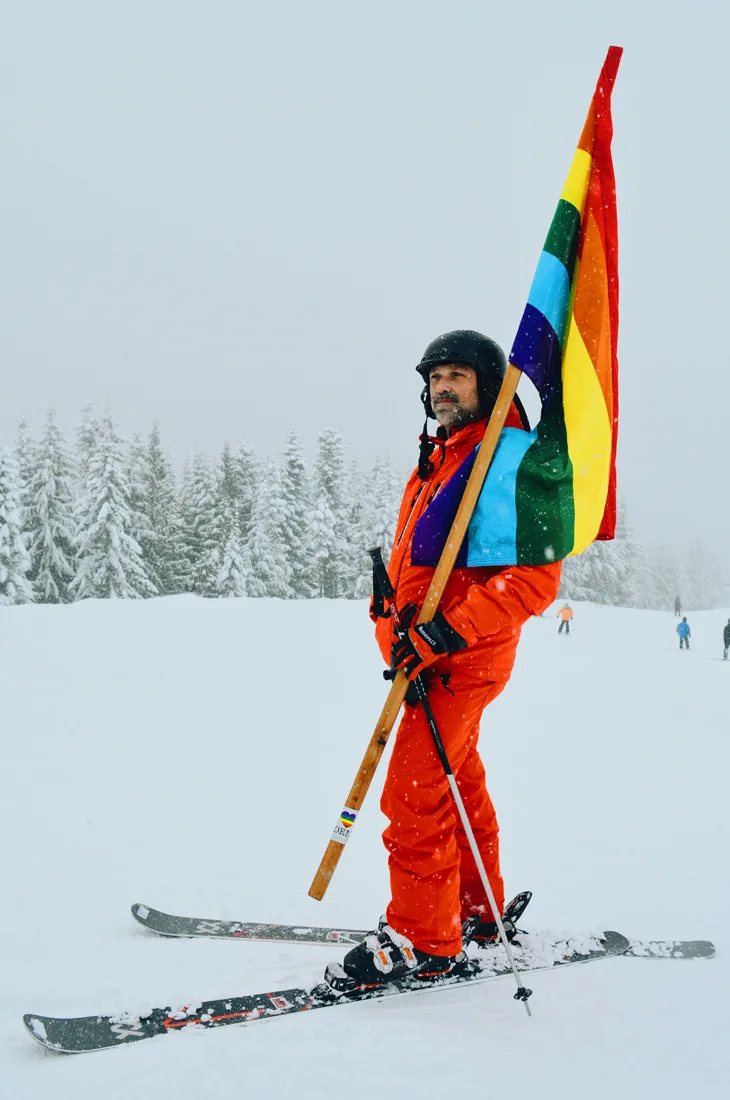 Come prepared with colorful rainbow flags | Whistler Pride 2018 Gay Ski Week © Coupleofmen.com