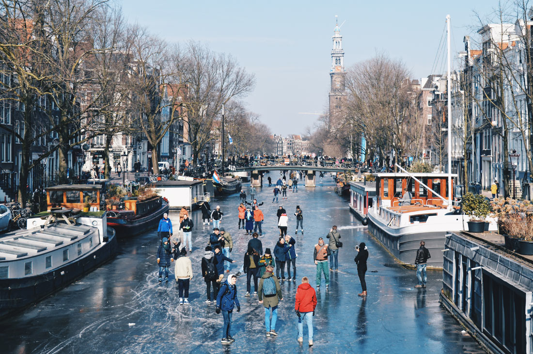 House-Boat Hotel and Westertoren | Amsterdam Frozen Canals © Coupleofmen.com