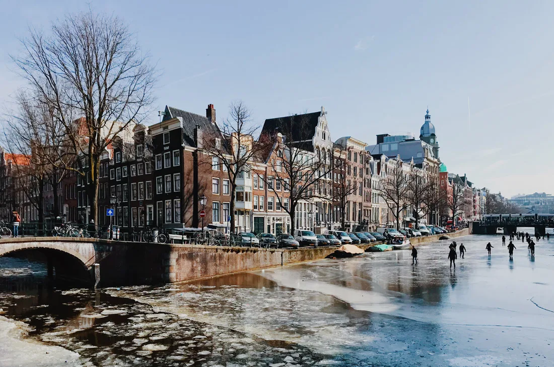Winter on Amsterdam's Frozen Canals Frozen Keizersgracht | Amsterdam Frozen Canals © Coupleofmen.com
