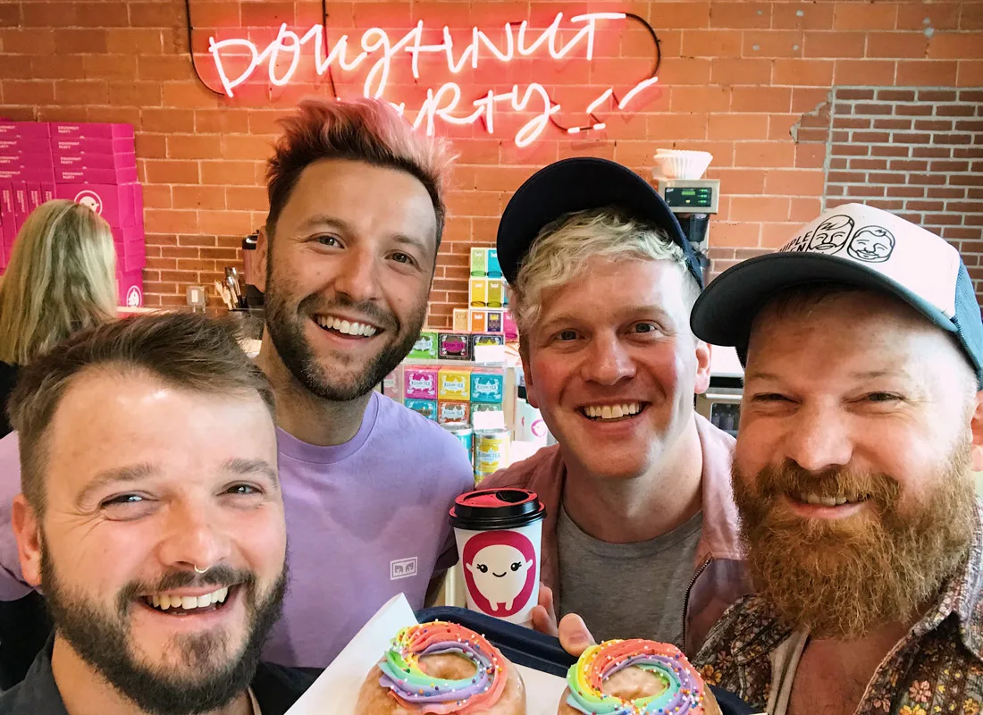 Gay Pride Parade Edmonton Canada Gay Couple Selfie with the Doughnut Party Boys | Gay Edmonton Pride Festival © Coupleofmen.com