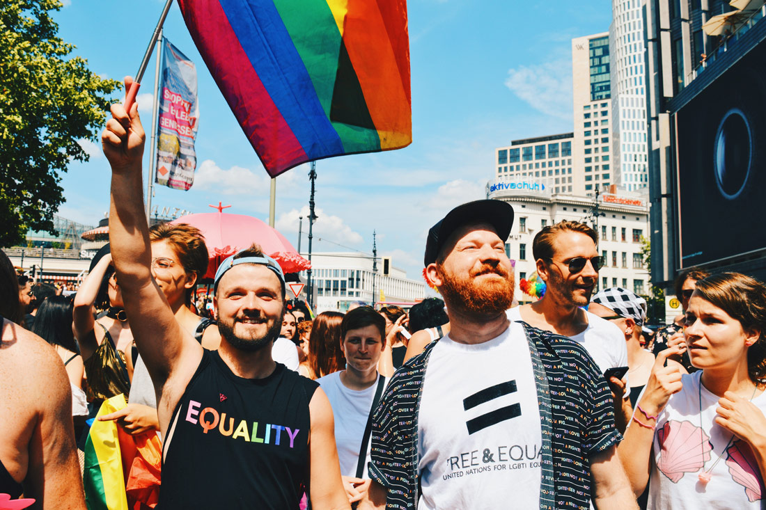 Waving proudly the Rainbow Flag during CSD Berlin Gay Pride 2018 © Coupleofmen.com