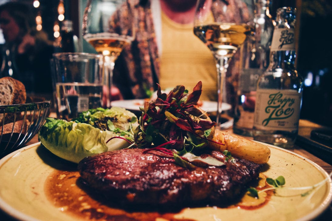 And a delicious Black Angus entrecôte with salad, roasted potatoes for Karl | Klaus K Hotel Helsinki Gay-friendly Tom of Finland Package © Coupleofmen.com