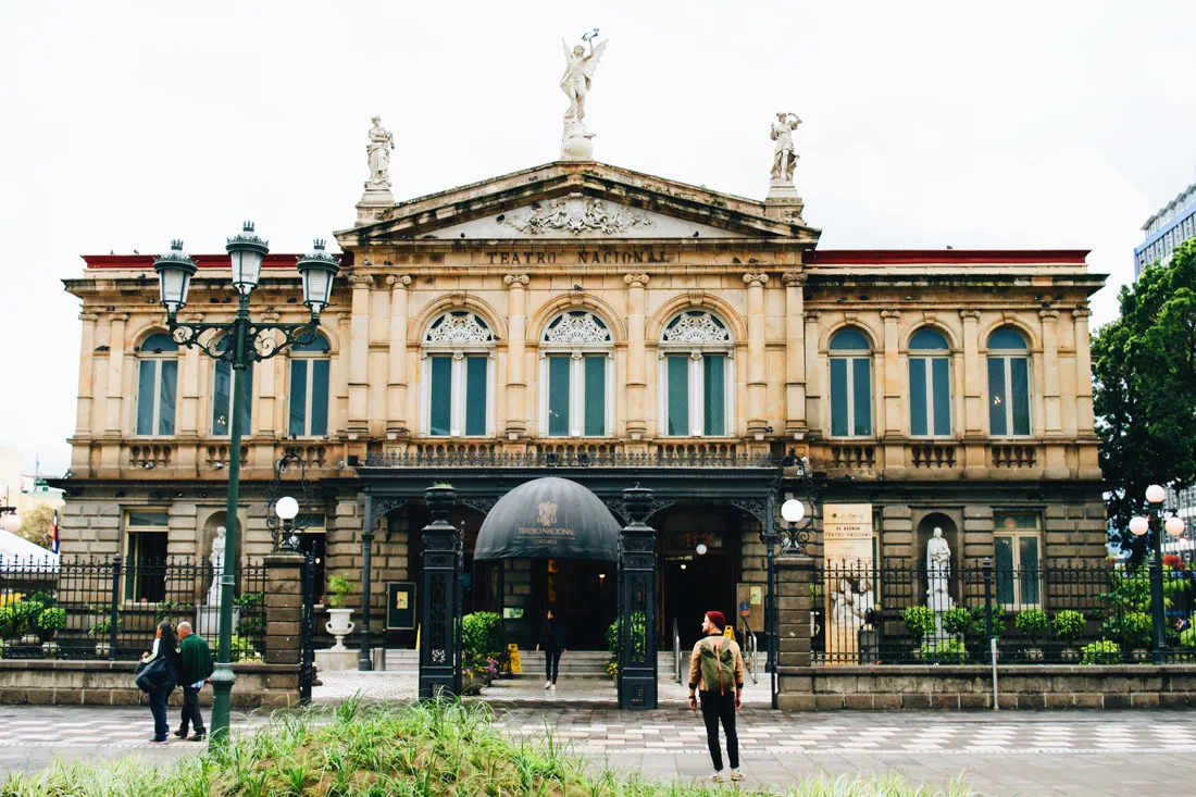 Gay Travel Journal Costa Rica Karl in front the The National Theater of Costa Rica Teatro Nacional de Costa Rica | Gay-friendly Costa Rica © Coupleofmen.com