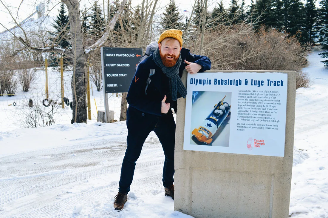 Daan before our ride at the Olympic Bobsleigh & Luge Track | Winter Road Trip Alberta Highlights Canadian Rocky Mountains © Coupleofmen.com