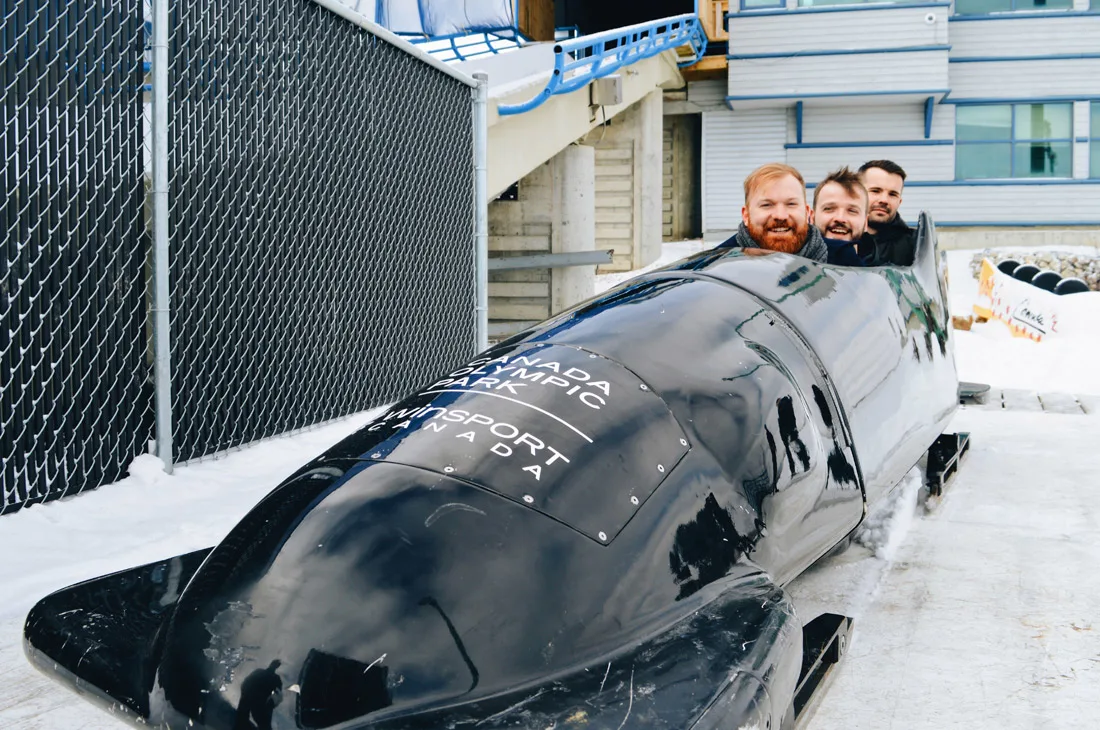 In a bobsled with Simon Dunn at Winsport | Winter Road Trip Alberta Highlights Canadian Rocky Mountains © Coupleofmen.com