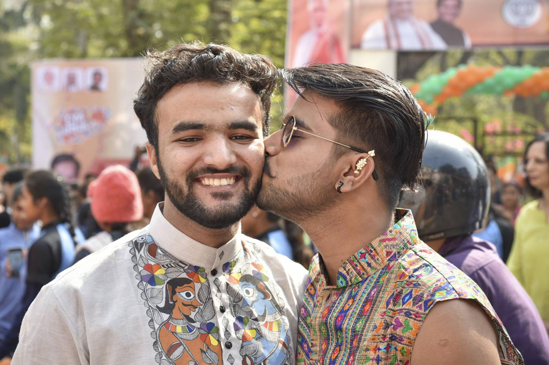 A gay kiss on the streets of Mumbai, India © QGraphy