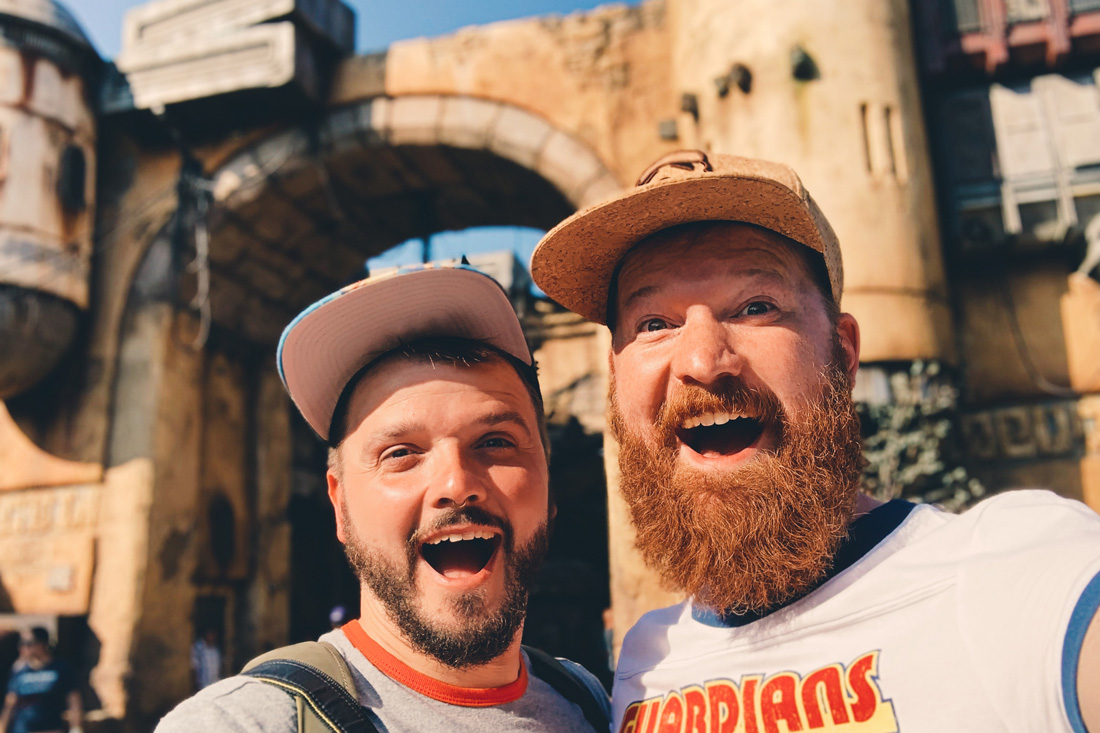 Bearded gay travel bloggers amazed Star Wars Land Batuu Disneyland Anaheim