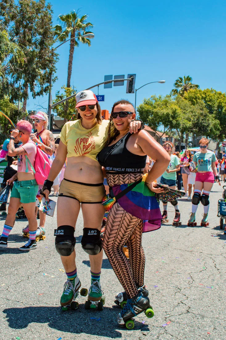 It doesn't get more rainbow California, doesn't it? LA Pride on roller skates posing in front of a palm tree. Love! © Coupleofmen.com