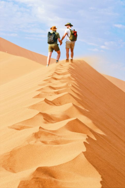 The wind is rough and brutal and so are the sand corns in our faces, pants and shoes © Coupleofmen.com