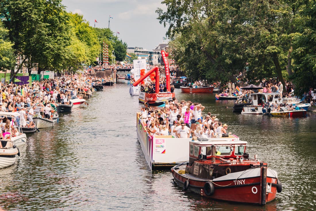 Pride Amsterdam 2018 from a Canal Parade Boat © Coupleofmen.com
