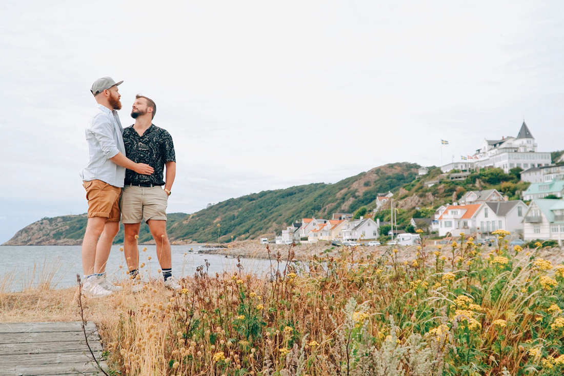 Gay Summer Road Trip Skåne 'I love you' moment in the cute little harbor in Mölle © Coupleofmen.com