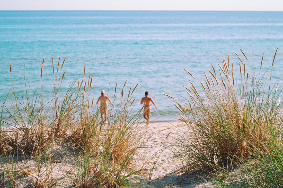 Gay Summer Road Trip Skåne Running naked over the most beautiful beach of Sweden right into the refreshing Baltic Sea © Coupleofmen.com