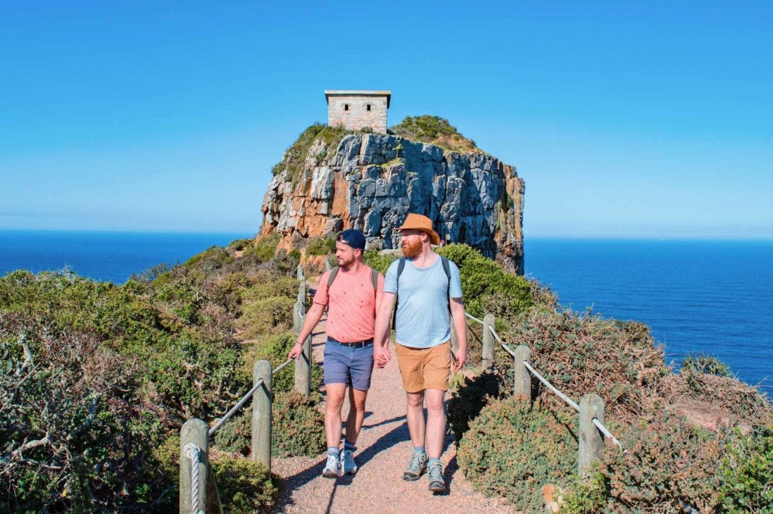Walking around hand-in-hand at Cape Point Nature Reserve © Coupleofmen.com
