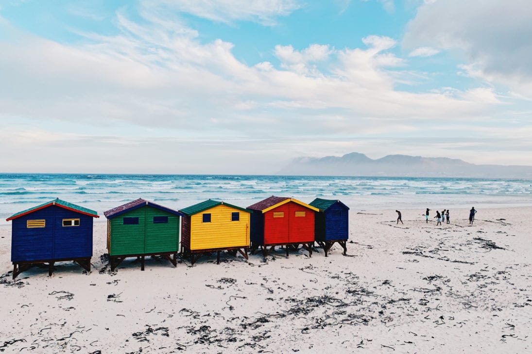 The world-famous colored beach houses of Muizenberg Beach © Coupleofmen.com