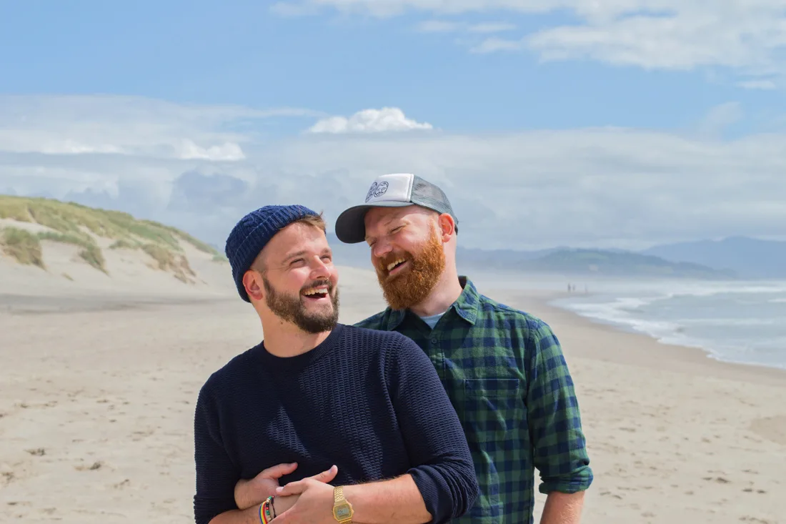 LGBTIQ+ & Gay Oregon Travel Guide Happy to be in Oregon and enjoying the Pacific beach together © Coupleofmen.com