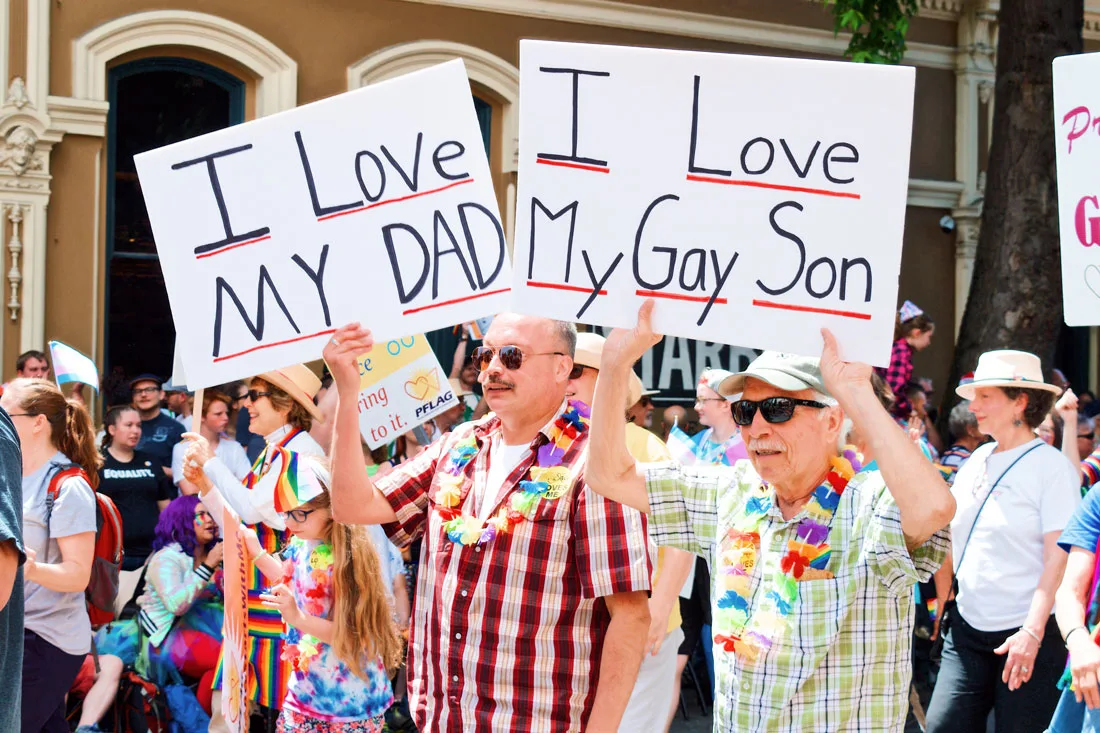 Pride LGBTQ+ rights Movement Proud son and a proud dad walking side by side © Coupleofmen.com