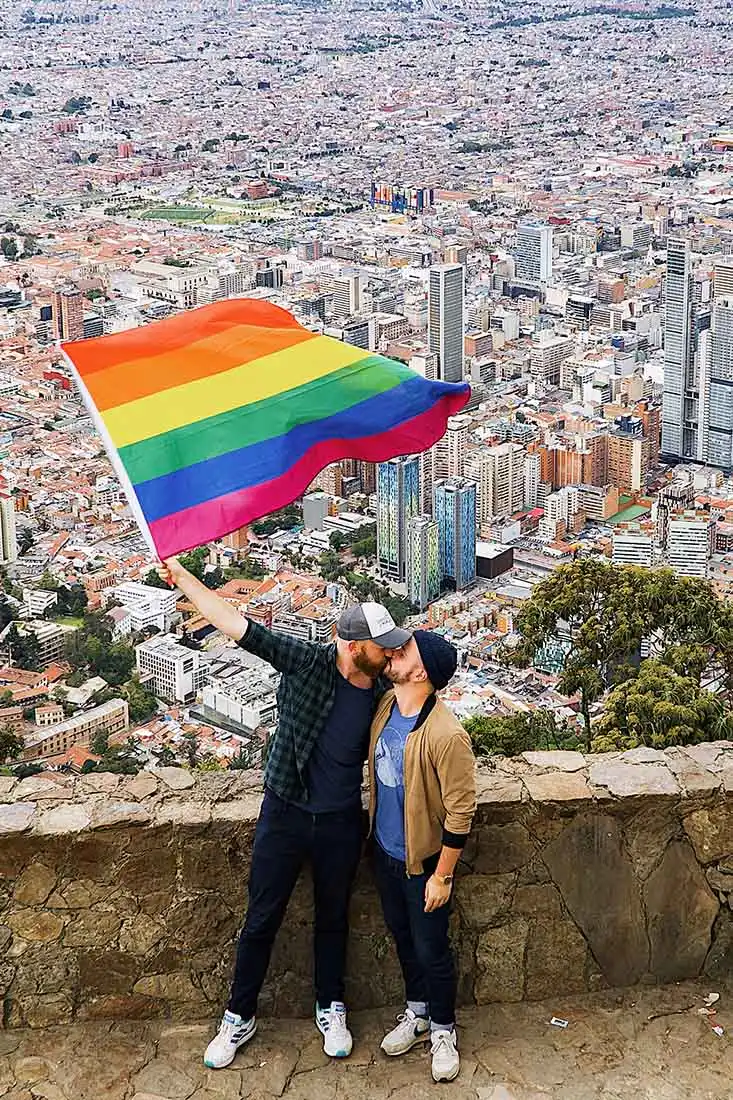 Waving our rainbow flag above the Colombian metropolis © coupleofmen.com