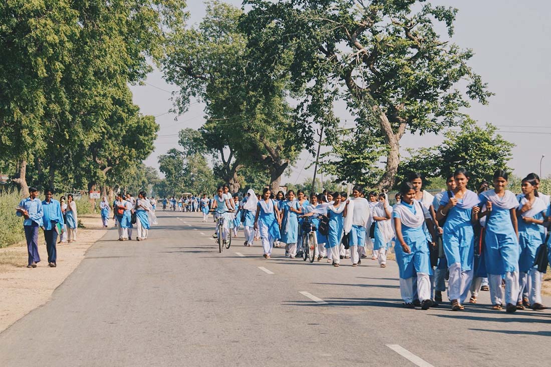 School was over - pupils in uniform on the way to Khajuraho © Coupleofmen.com