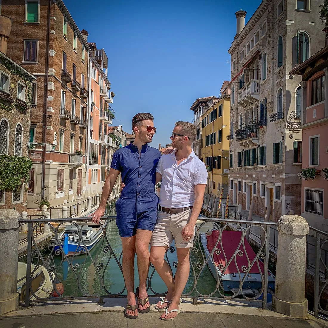 A lovely gay couple traveling around the world