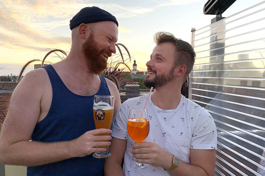 Gay Saunas in Europe Munich Gay City Trip Perfect sun set moment with a drink at Deutsch Eiche Rooftop Bar © Coupleofmen.com