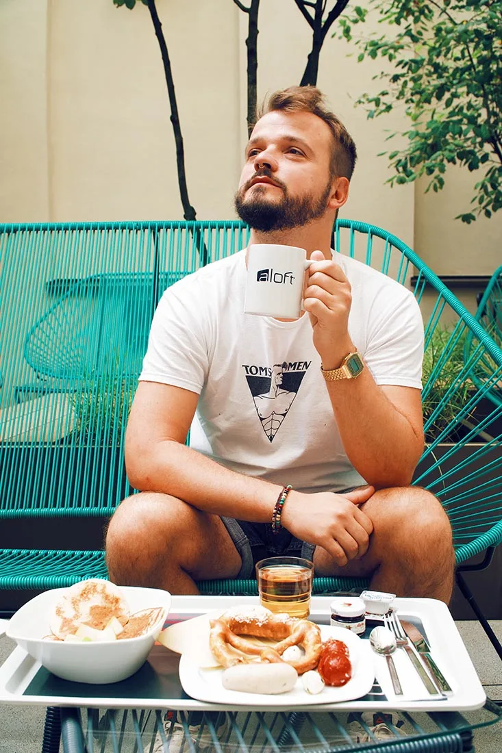 Karl loves a good morning coffee especially when served in the Aloft Munich coffee mug © Coupleofmen.com