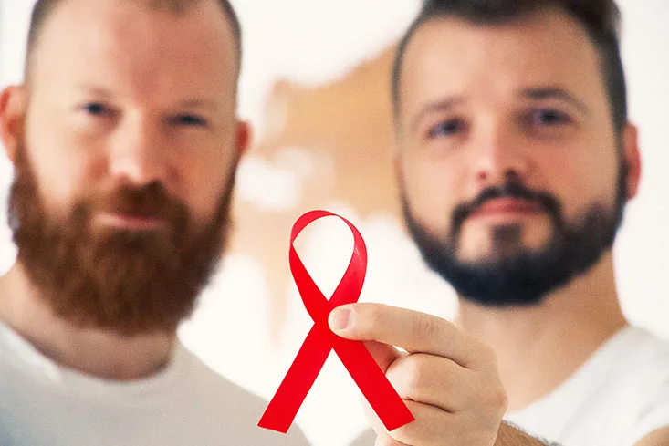 World Aids Day - A Kiss in support of people with HIV © Coupleofmen.com