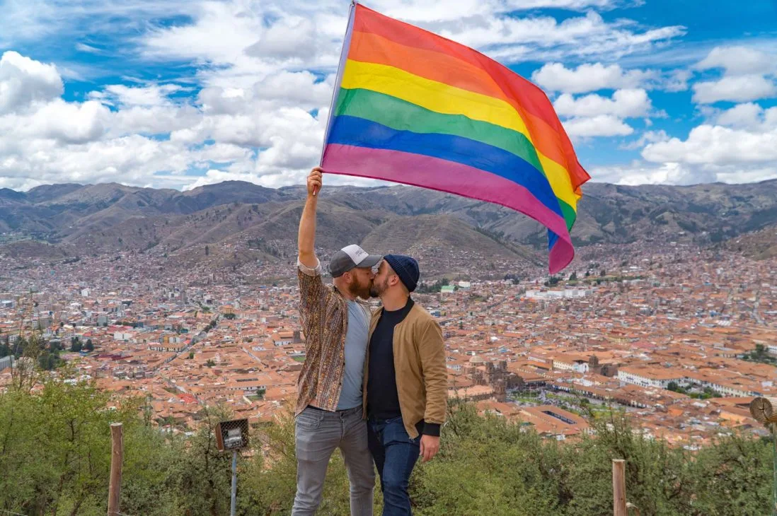 Proudly waving the Rainbow Flag over Cusco during our Gay Peru Adventure © Coupleofmen.com