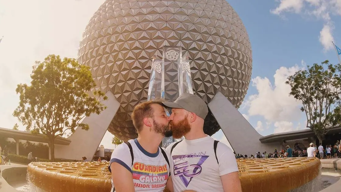 Hand in Hand in Disney's EPCOT - Disney supporting LGBT Community with the new Disney Pride Collection © Coupleofmen.com