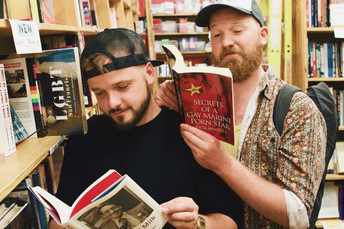 A Gay Couple of Men is reading books in Powell's Book Store in Portland, Oregon © Coupleofmen.com