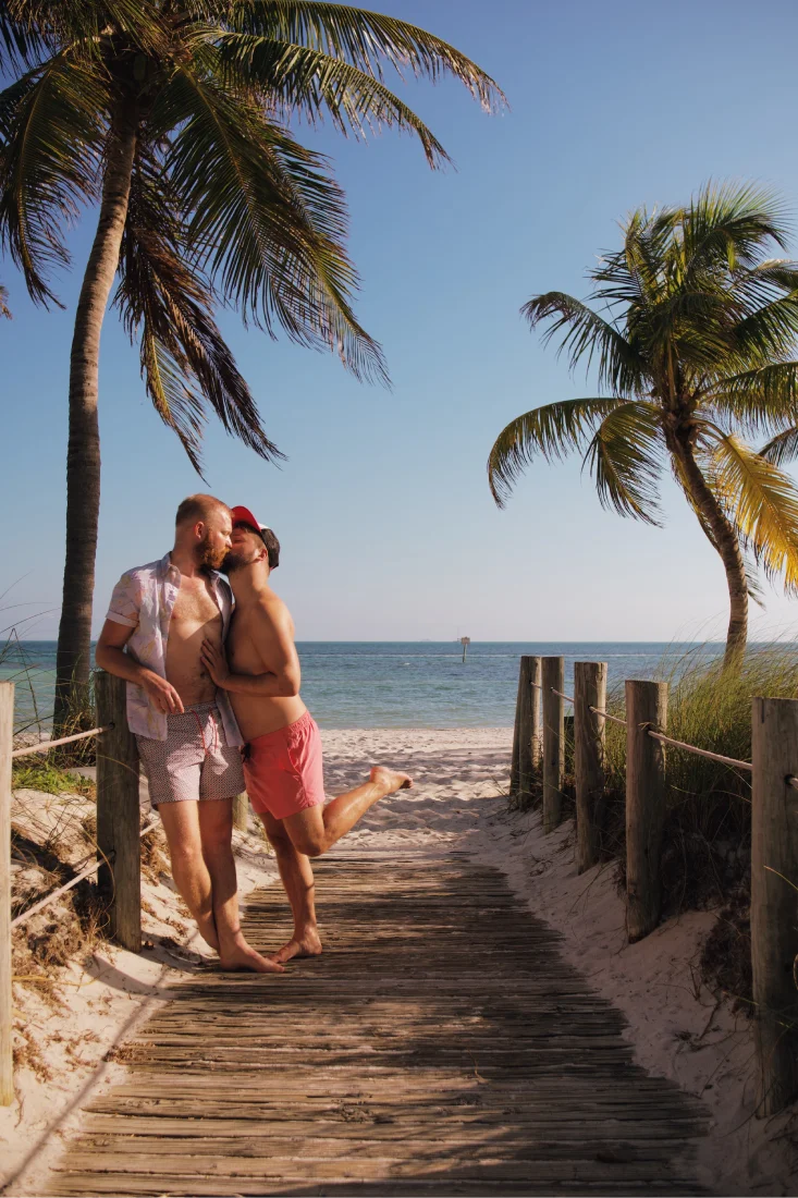 Gay Florida Key Gaycation Kiss at Smathers Beach Key West © Coupleofmen.com