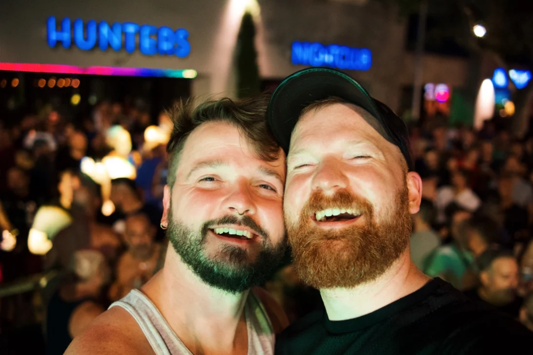 Couple of Men in front of Hunters Nightclub during Pride 2023 © Coupleofmen.com