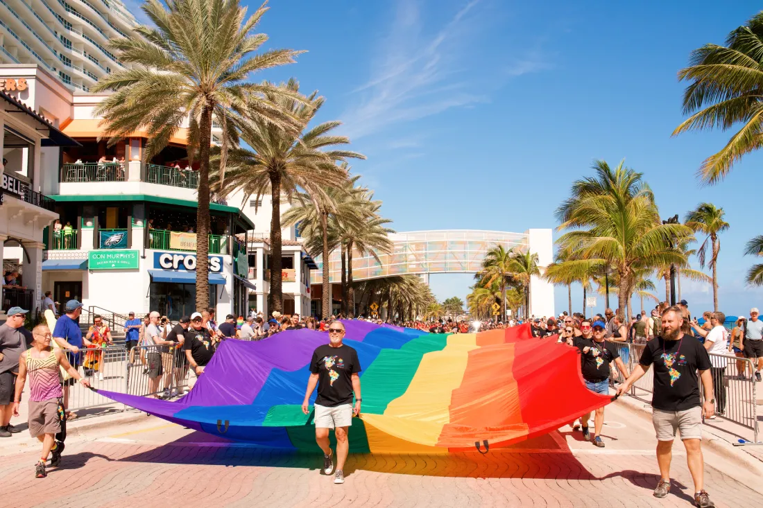 Huge Rainbow flag carried over Route 1A aka GAY1A in Fort Lauderdale © Coupleofmen.com