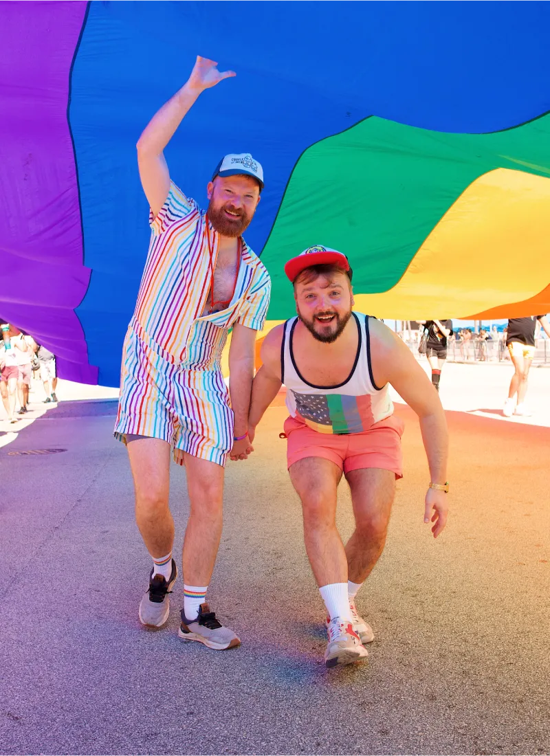 Pride Fort Lauderdale: We as a Gay Couple walking under the rainbow © Coupleofmen.com