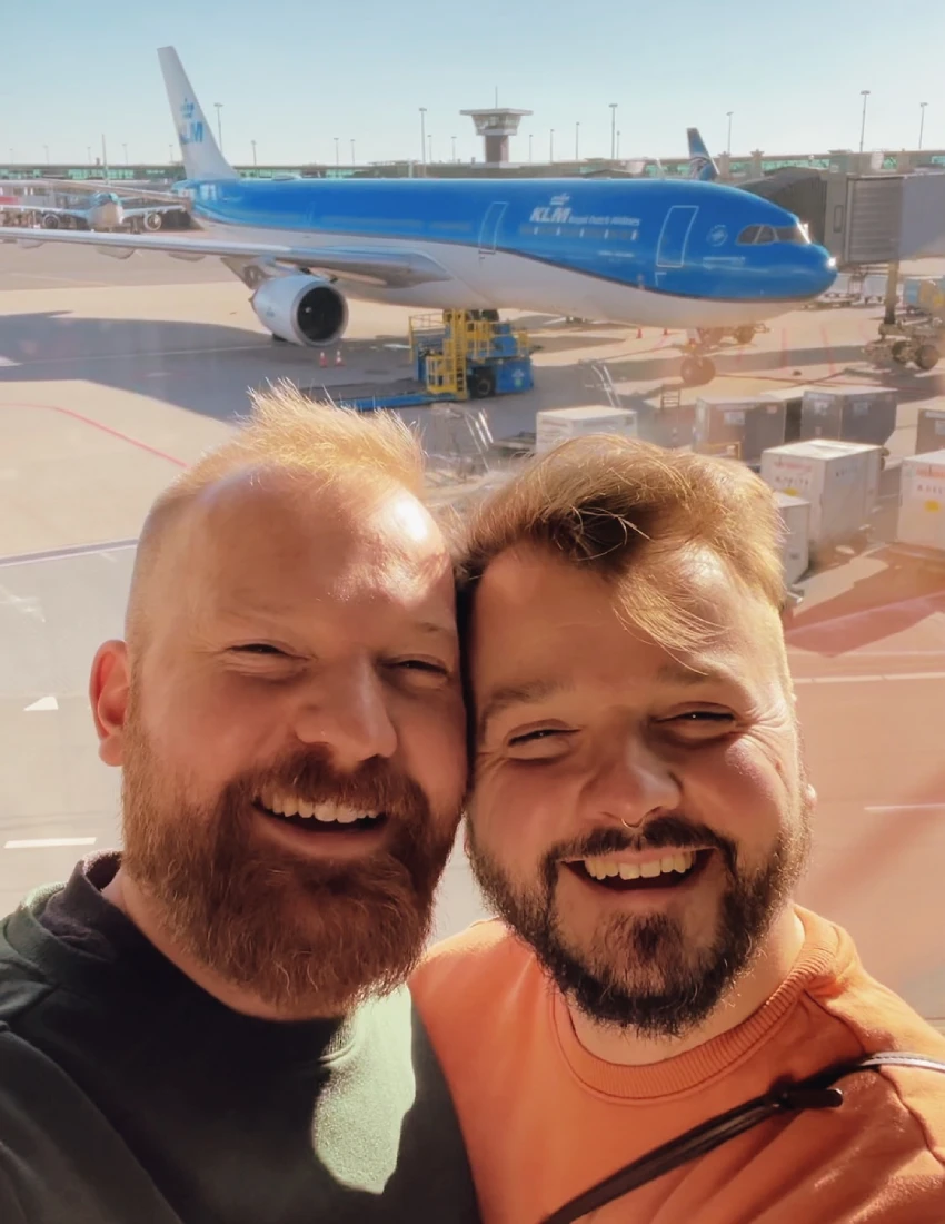 Flying with KLM from Amsterdam to Miami: Selfie just before boarding the A-330 of KLM flight number KL627 at Amsterdam Airport Schiphol © Coupleofmen.com