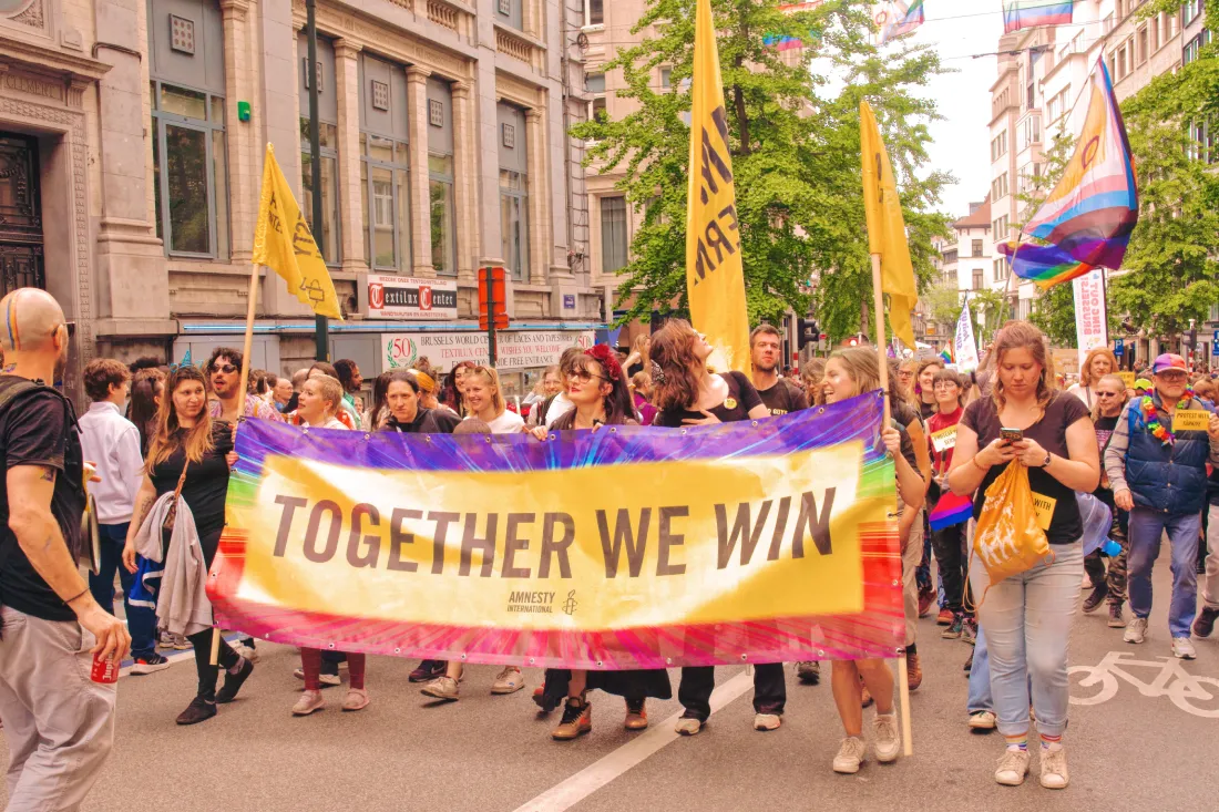 Together we can win! Amnesty International marching Brussels Pride 2023 © Coupleofmen.com