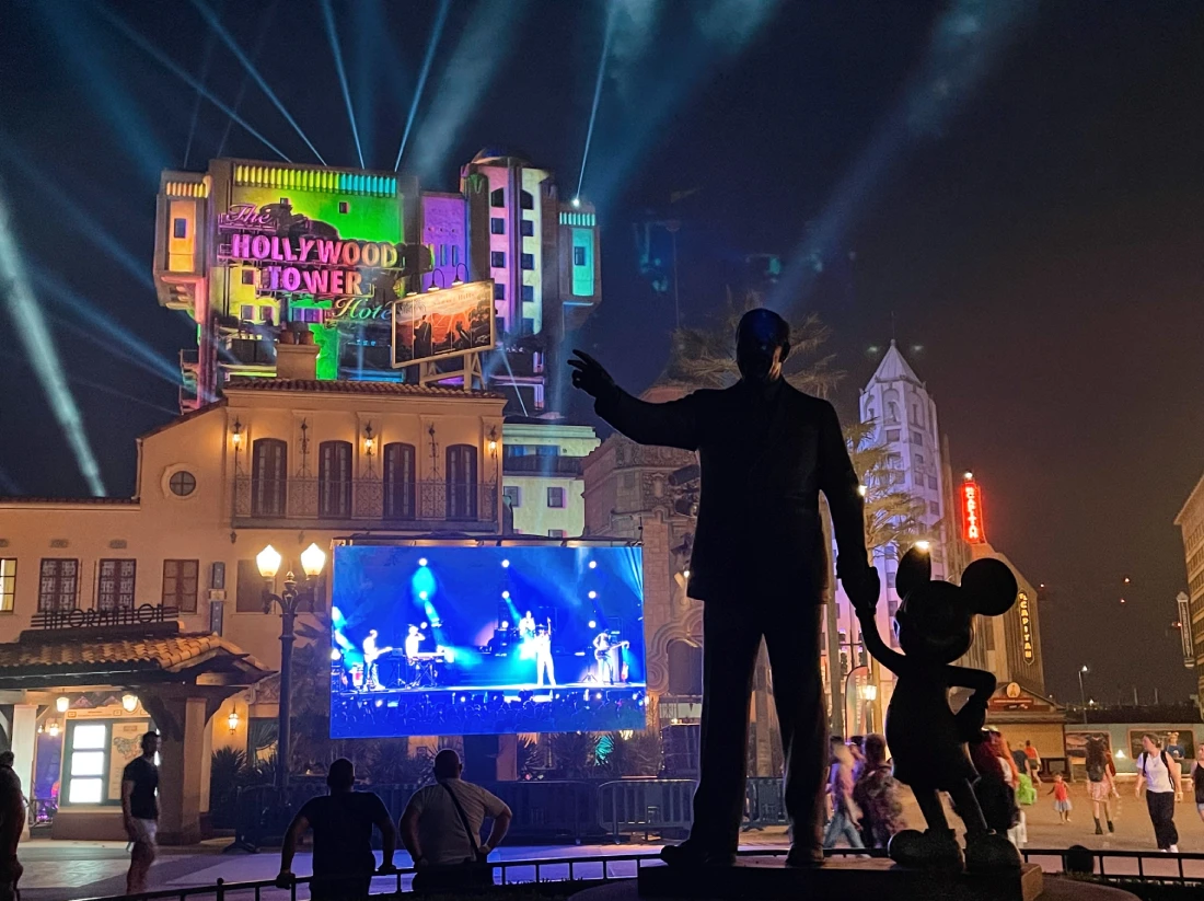 Gay Highlights Disneyland Paris Pride 2023 Hollywood Tower of Terror illuminated in rainbow colors with Walt Disney in the front © Coupleofmen.com