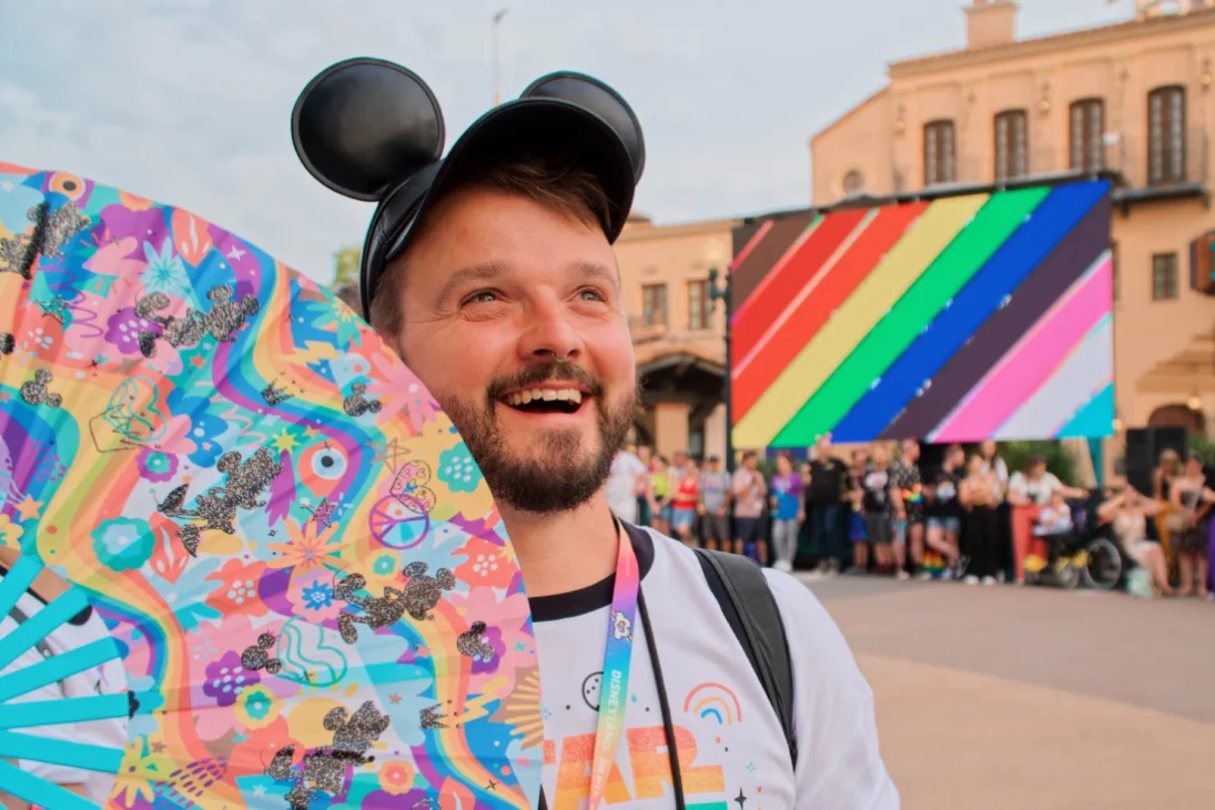 Karl cannot wait for the Disneyland Paris Pride Parade to begin © Coupleofmen.com